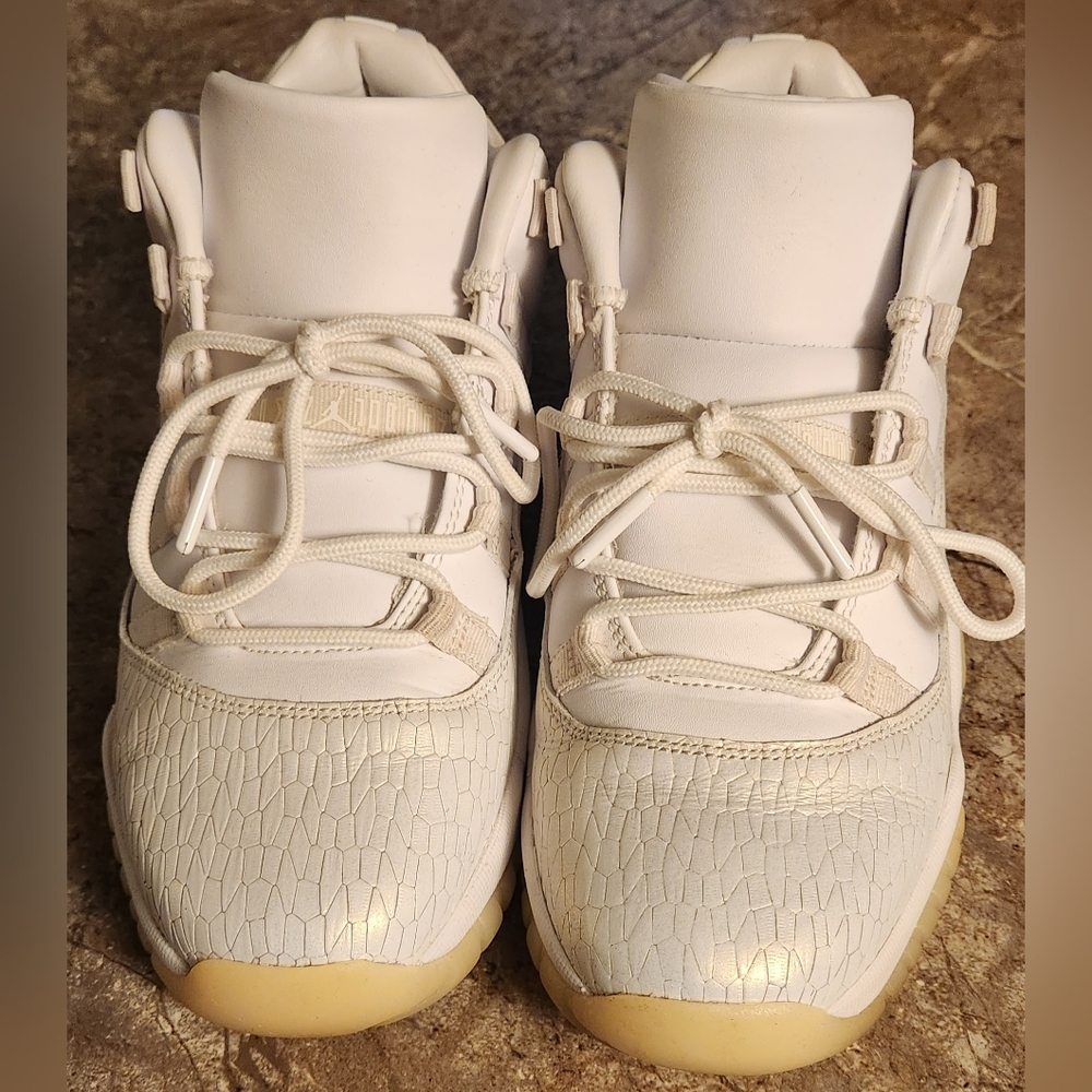 Air Jordan 11's frosty white low tops